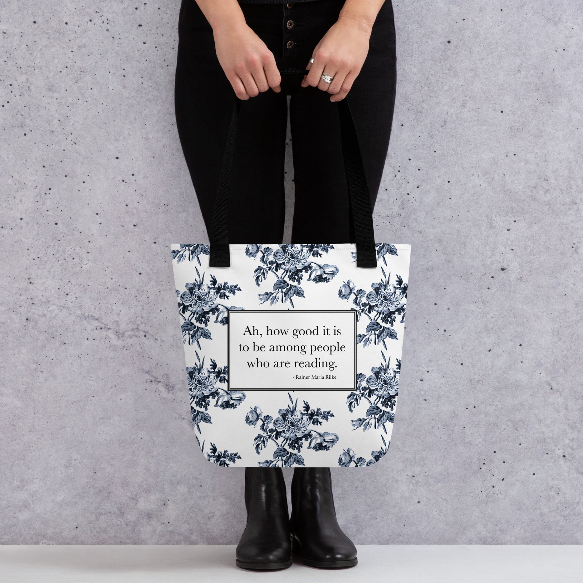White tote bag with Rilke quote ‘Ah how good it is to be among people who are reading’ and toile print on the bottom