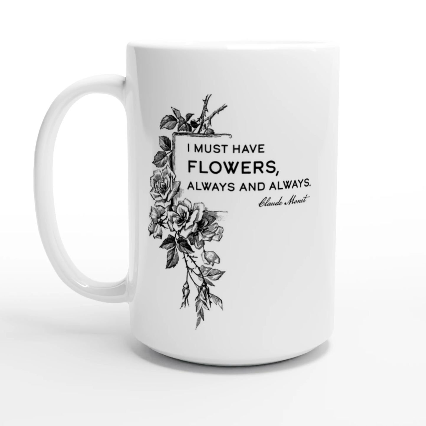 White mug with black floral design and text on a white background featuring Claude Monet quote. 