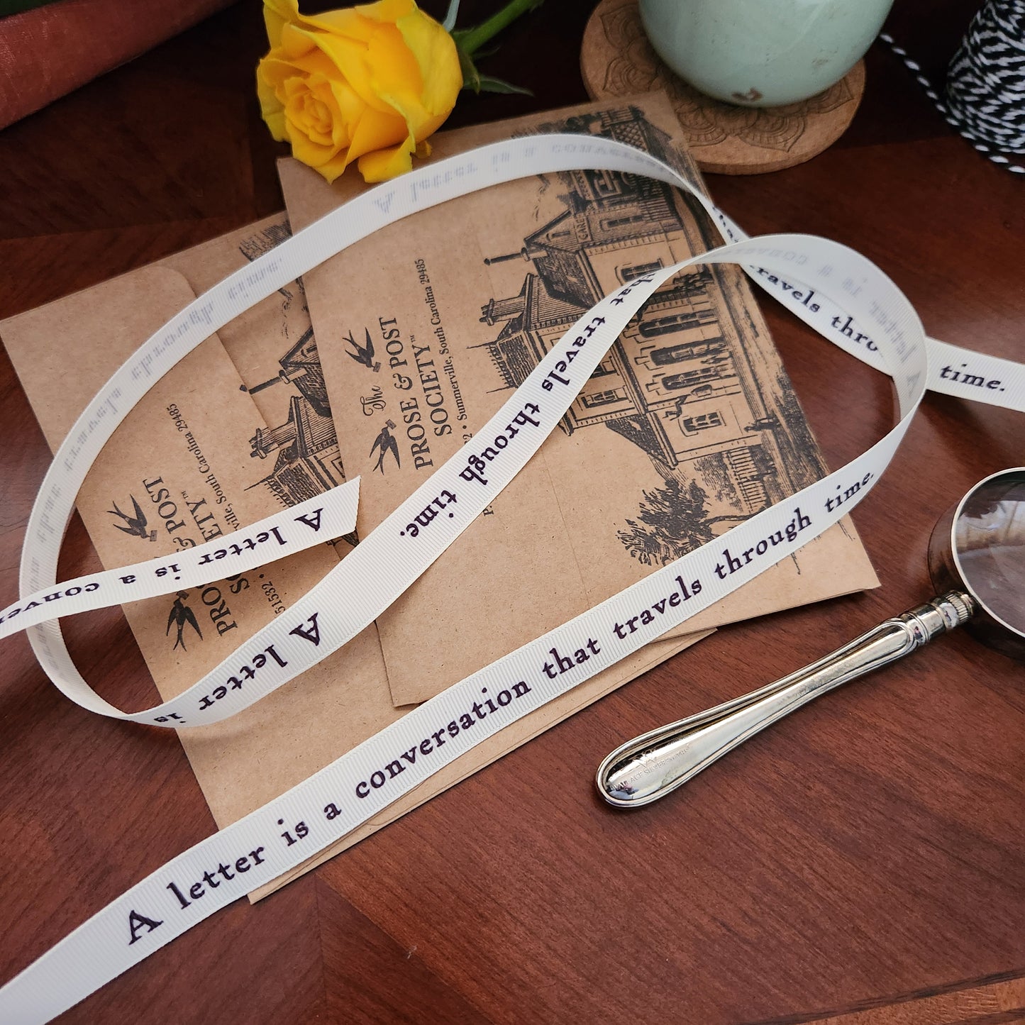 Decorative ribbon with quote about letters
