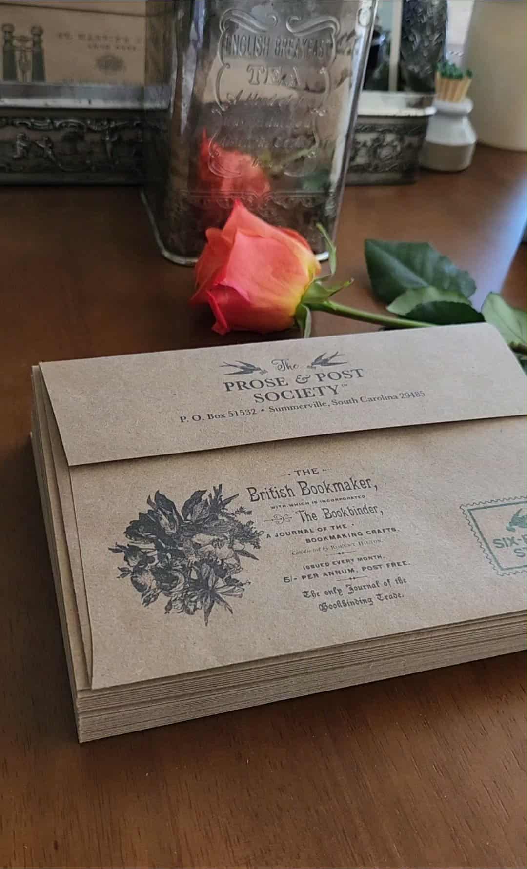 Six-Penny Stamp - The Prose & Post Society kraft envelope with vintage imagery and return address