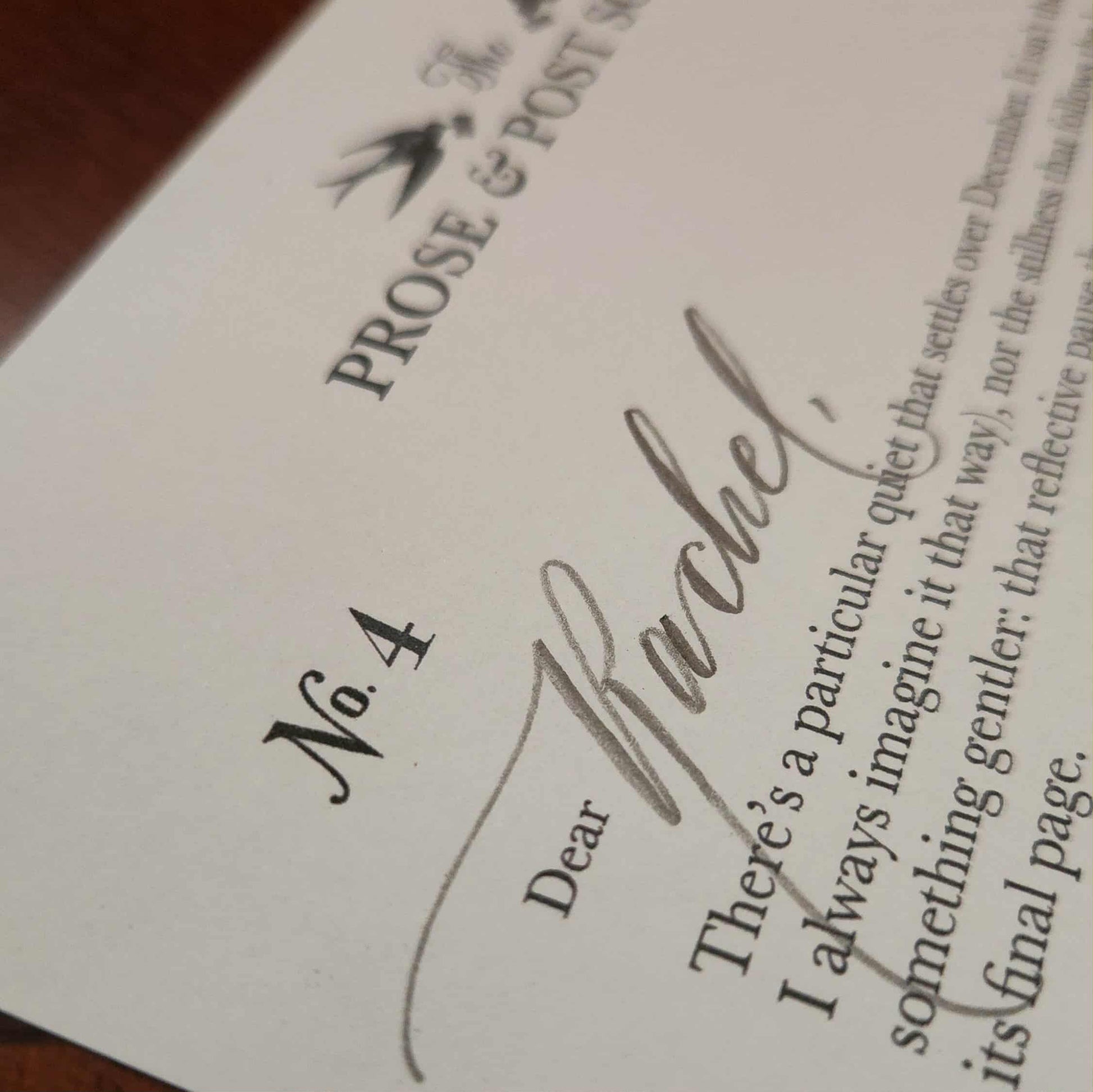 Close-up of a letter with 'Dear Rachel' personalization in calligraphy on a Prose & Post letter.